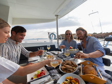 Athens Luxury Catamaran Cruise with Greek Meal & Drinks
