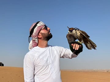 Dubai Red Dune Desert Safari with Camel Ride & BBQ Dinner