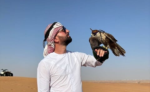 Dubai Red Dune Desert Safari with Camel Ride & BBQ Dinner