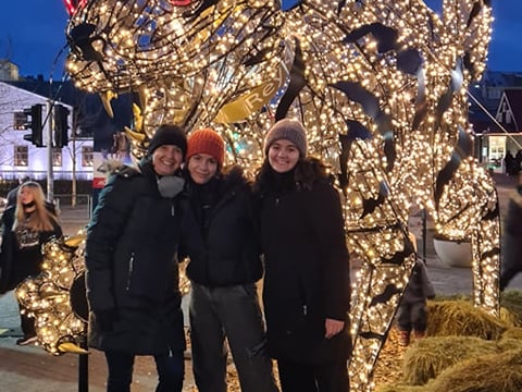Travellers posing for a picture in front of the Icelandic Christmas Cat