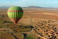 Soar above Marrakech in a hot air balloon and indulge in a delightful meal in the sky. Experience breathtaking views of the Moroccan landscape while savoring an unforgettable dining adventure.