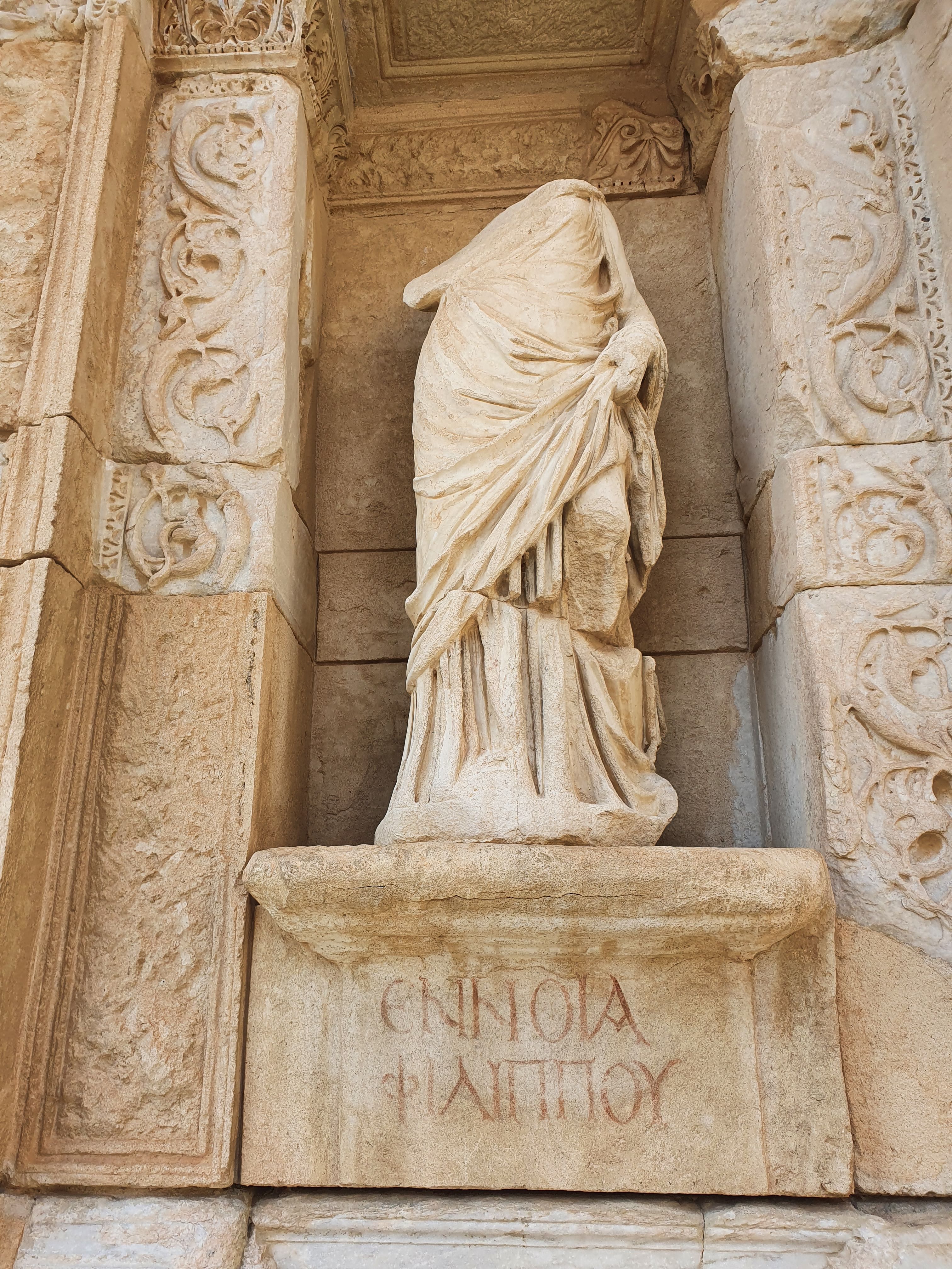 statues in the library of Celsus