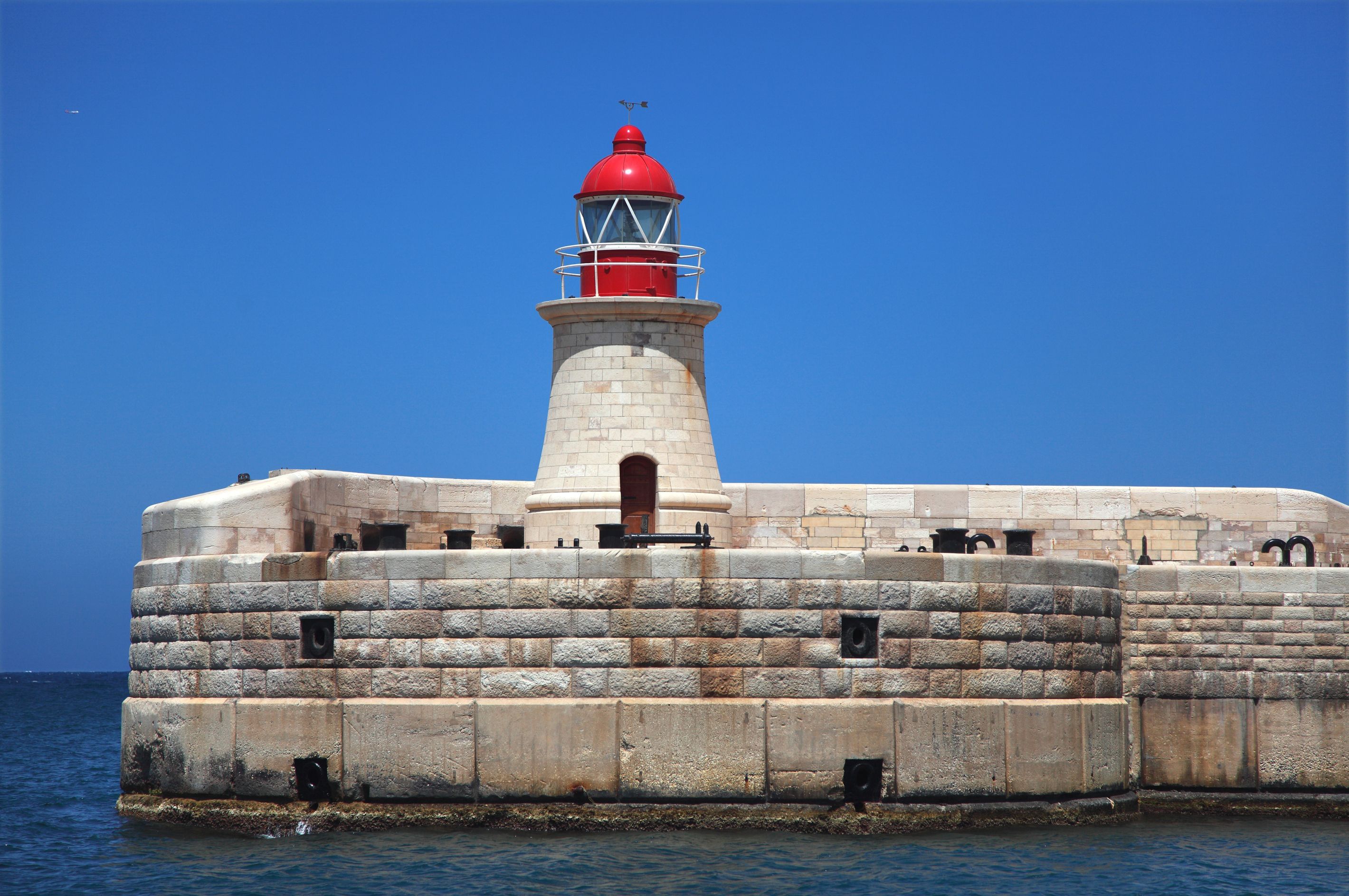 Ricasoli Breakwater Lighthouse at the entrance of the Grand Harbour, Valletta