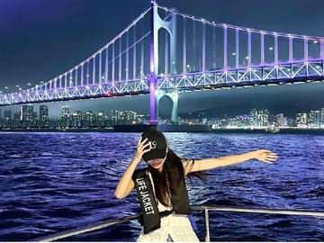 Night yachting experience with a stunning view of Busan's skyline.