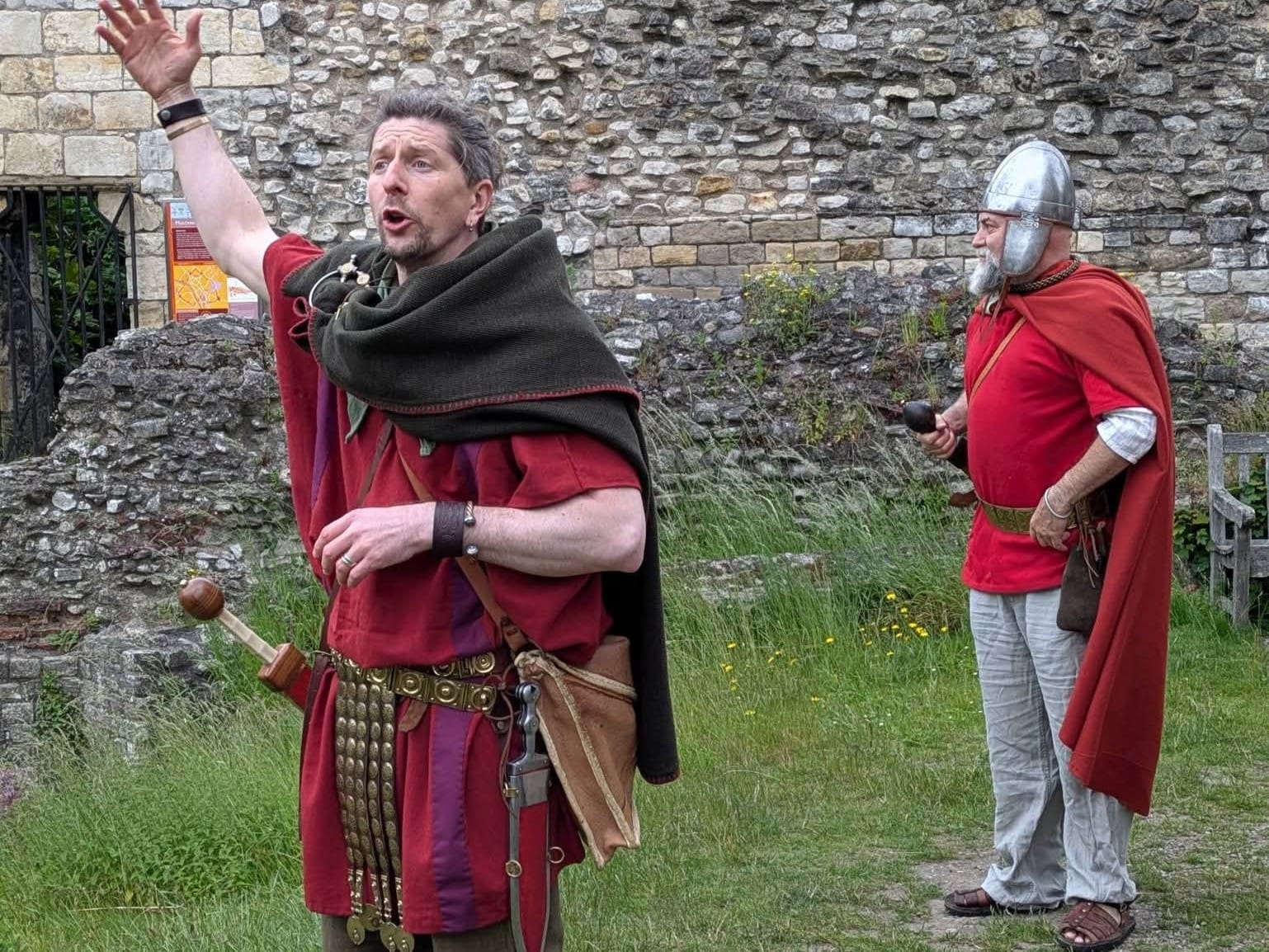 Two splendid Roman soldiers stand in front of the Multangular Tower in Museum Gardens, York.
