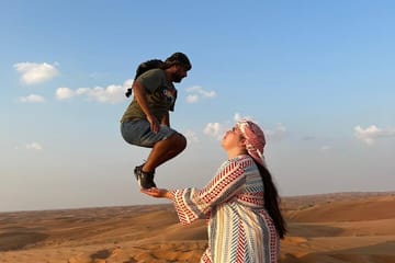 Evening Desert Safari Camel Ride Dinner Live Shows in Abu Dhabi