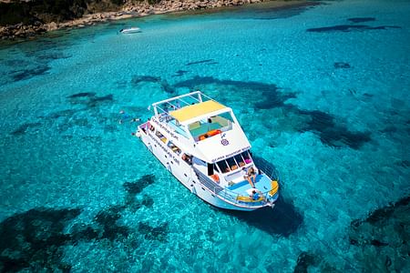 Discover the Blue Lagoon: Scenic Bus and Water Slide Boat Adventure