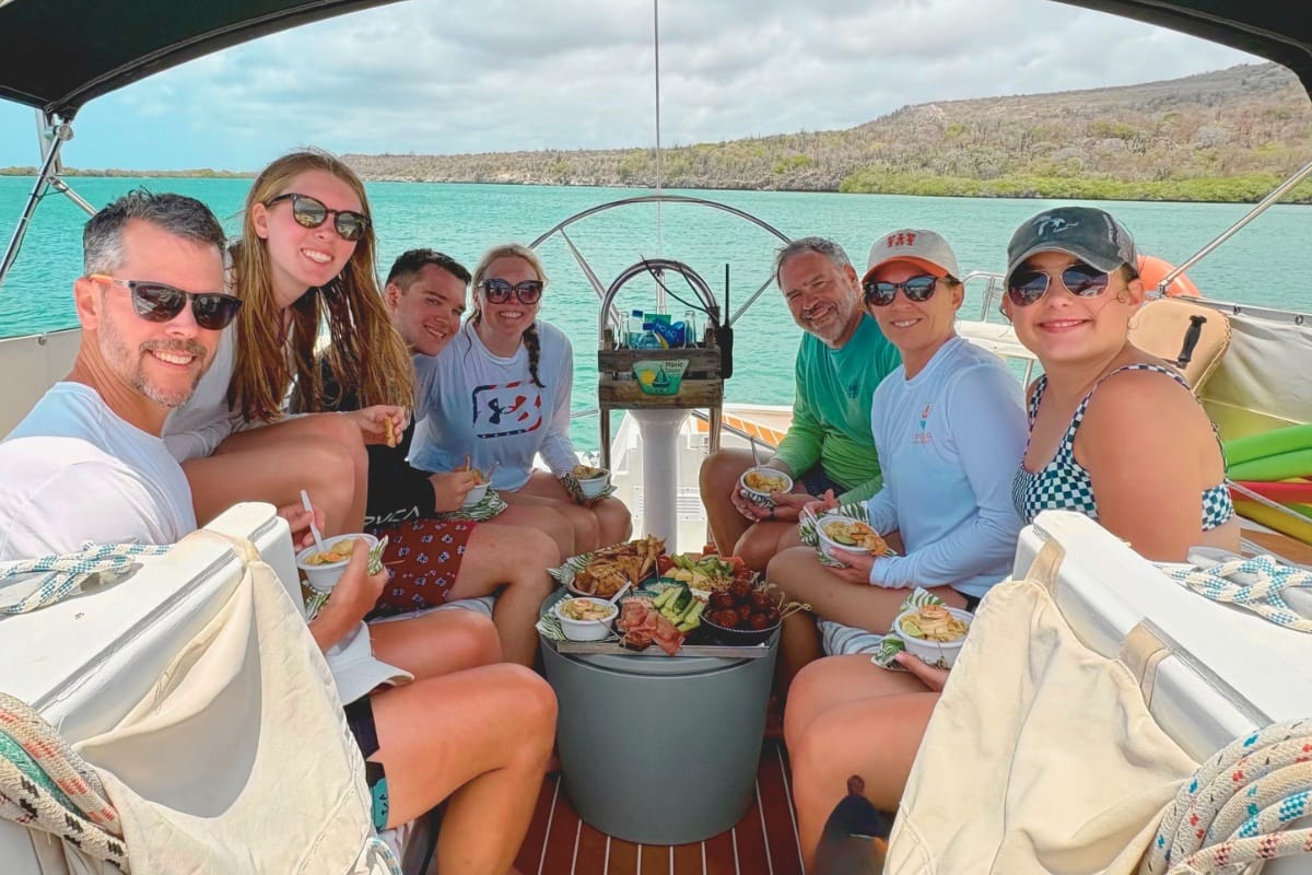 Family enjoying delicious lunch tour by Maxie Sailing in Curacao