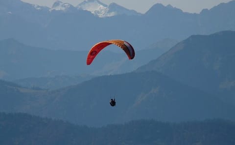 Paragliding Adventure Over Phewa Lake in Pokhara, Nepal