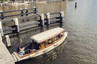 Classic saloon boat Undine on the Amstel river