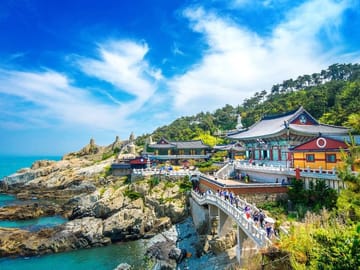 The stunning coastal view of Haedong Yonggungsa Temple built along the rocky cliffs.