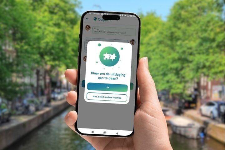 Phone screen showing Amsterdam scavenger hunt challenge pop up