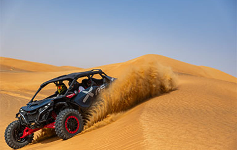 Desert Buggy Adventure with Camel Ride and Sandboarding in Sharjah