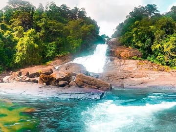 Full Day Tour of Ratnapura: Waterfalls, Gem Mines, and Temple