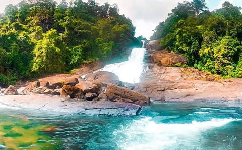 Full Day Tour of Ratnapura: Waterfalls, Gem Mines, and Temple