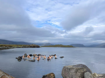 Experience traditional Icelandic bathing culture as you take a bath in the serene hot springs