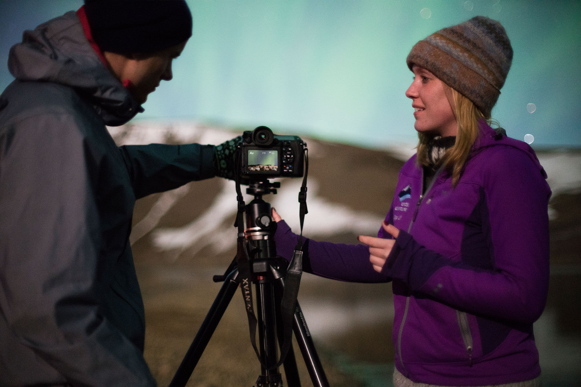 Photographing the sky during Northern lights super jeep tour from reykjavik