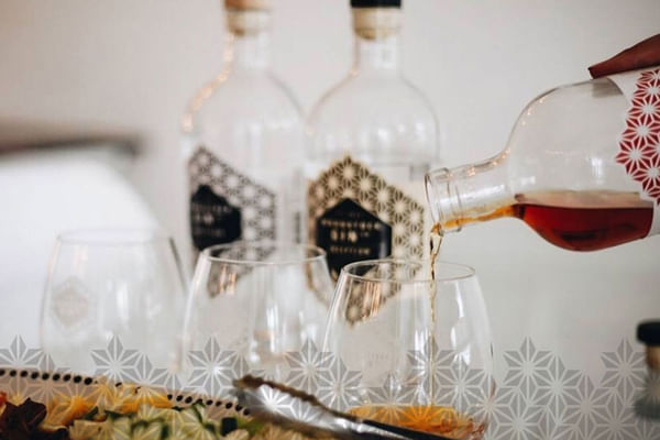 Visit the Woodstock Gin Company to sample fynbos-infused gins in the heart of Cape Town.