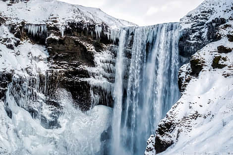 Skogafoss Waterfall with Ice and Snow