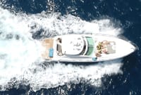 Cruise the Cabo coastline in ultimate style on your private luxury yacht with full crew.