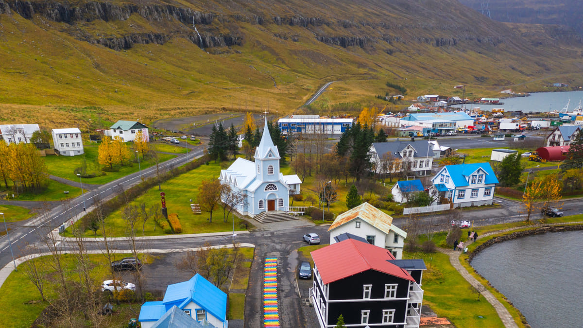 Art, history, and natural beauty meet in the rainbow-paved streets of Seyðisfjörður.