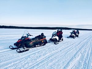 Snowmobile and Ice Fishing Experience