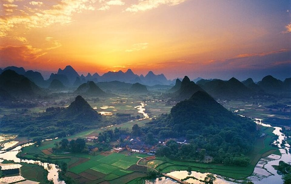 Li River Cruise Yulong River Bamboo Rafting Sunset Day Tour