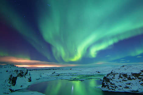 The aurora borealis is best seen on a clear and cold, crisp night.
