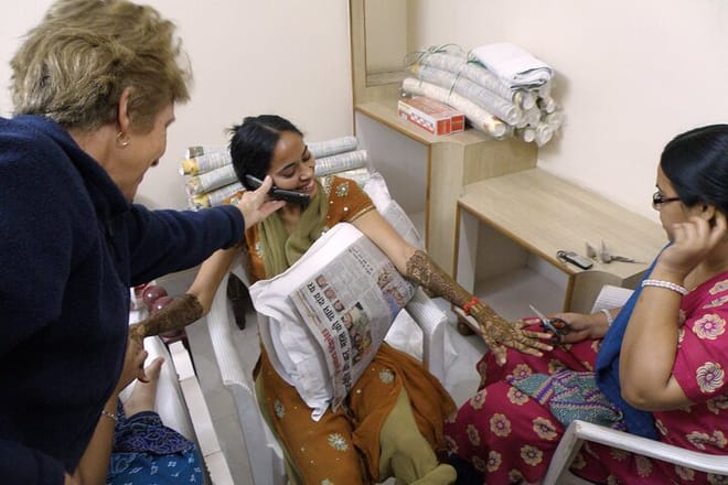 Applying Heena in hands