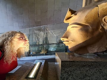 Guests exploring the Grand Egyptian Museum Cairo during an Egypt guided tour.