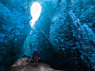 A man exploring at Jokulsarlon ice cave tour