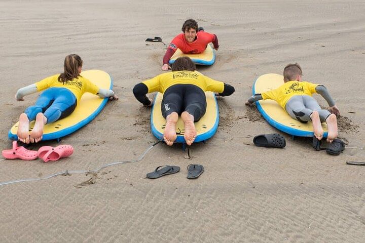 Surfing Strandhill waves. Sligo. Guided.