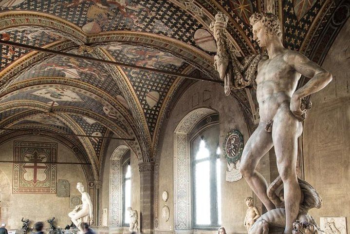 One of the halls of Bargello Museum with its frescoed ceilings and sculptures