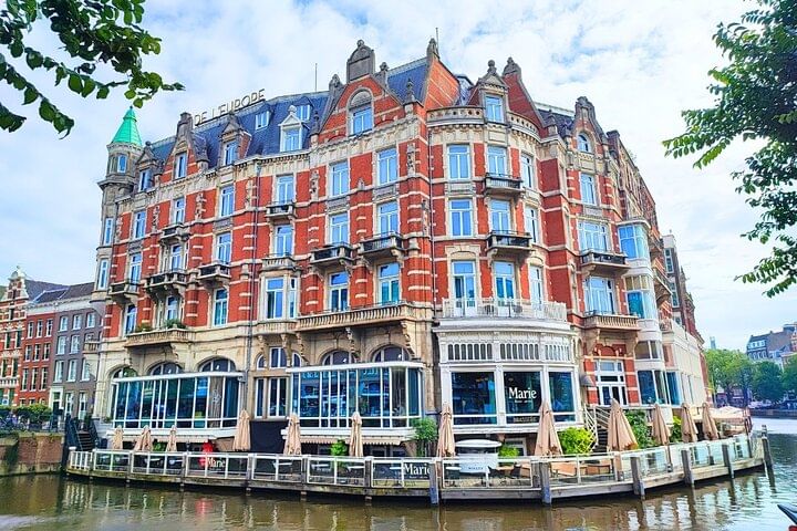 View of the Hotel l'Europe during the city game by Qugato in Amsterdam