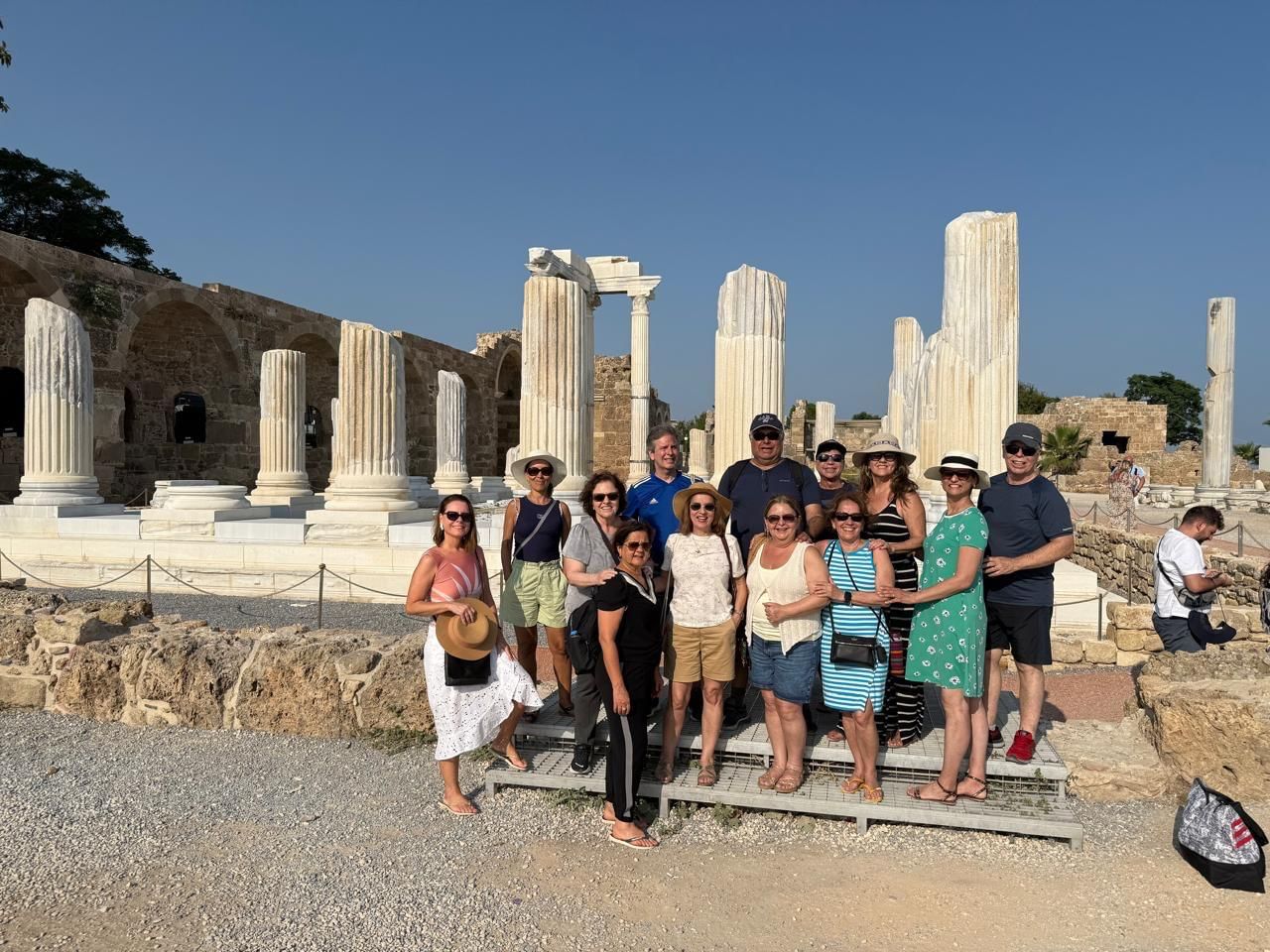 “Our tour group smiling and posing together with their guide at Pamukkale.