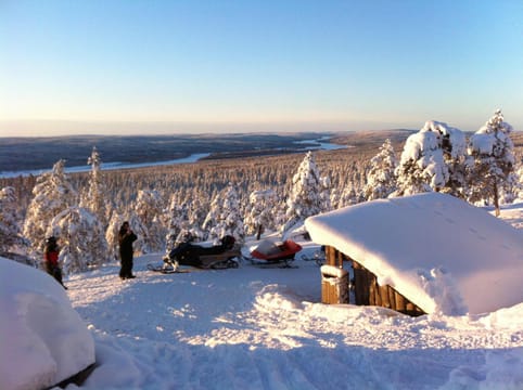 Snowmobile Safari Experience Driving into Lappish Forests 2H	