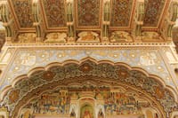 A hand painted fresco with a religious scene is painted on the wall of a Haveli in Mandawa