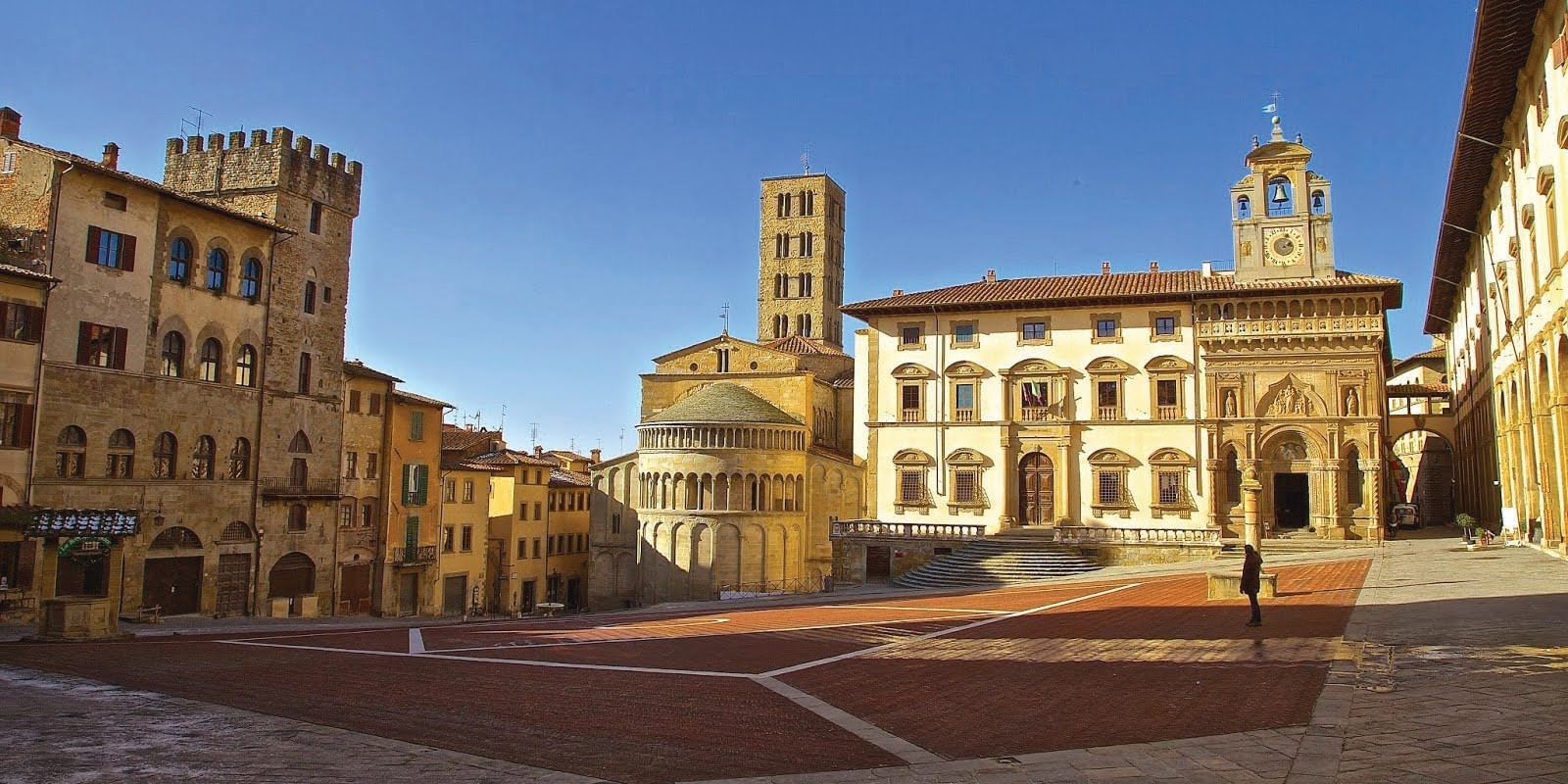 View of one of Arezzo's squares with a church and its BellTower
