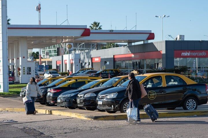 Line of taxis and transfer vehicles waiting outside Ezeiza Airport