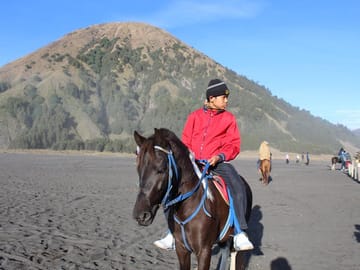 Riding a horse to the crater