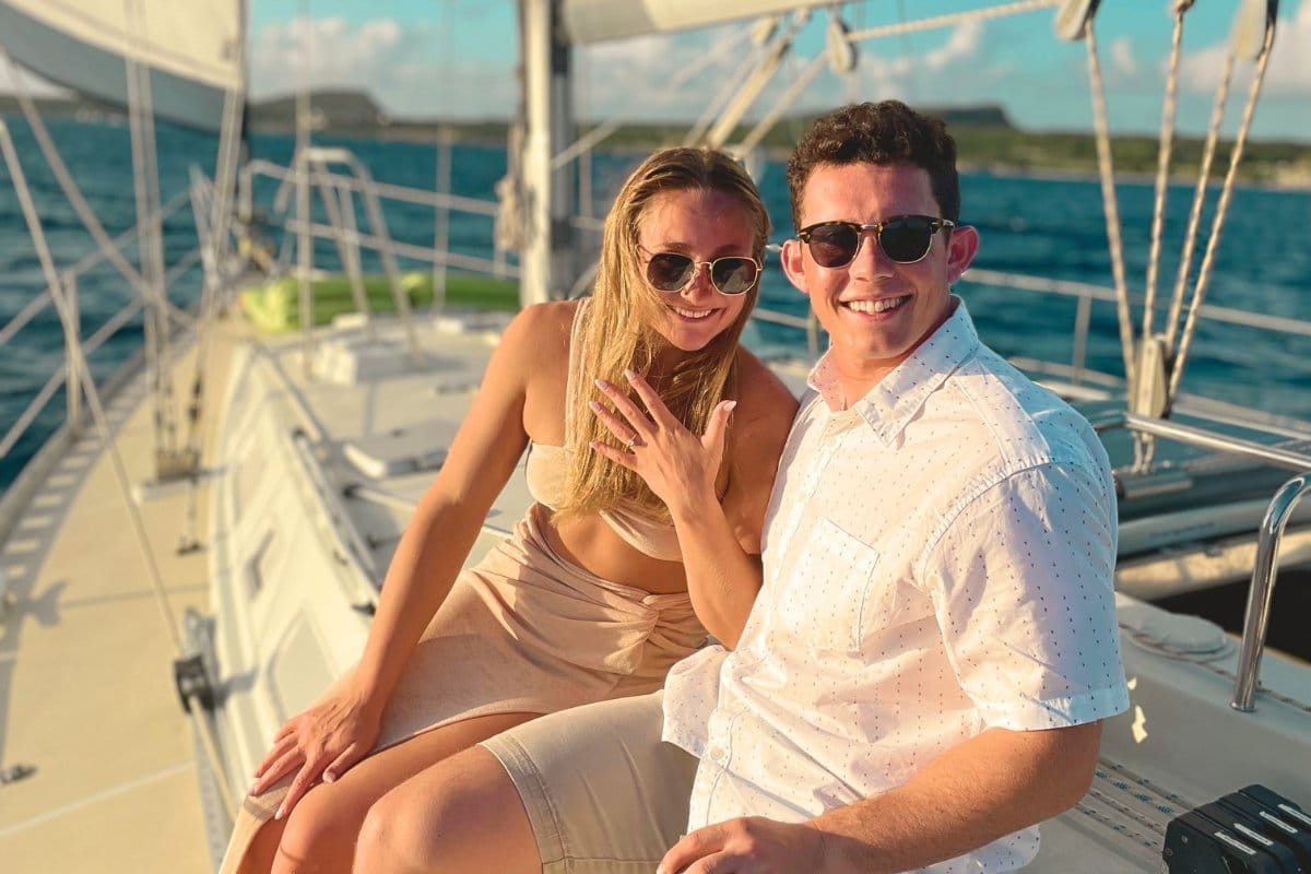 Romantic couple enjoying private sunset cruise in Curacao with Maxie Sailing