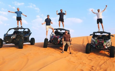 Premium Desert Safari with Dune Buggy, Camel Ride, and BBQ in Dubai
