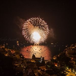 Mid-August in Positano by boat with fireworks show