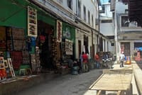 Narrow streets are lined with shops