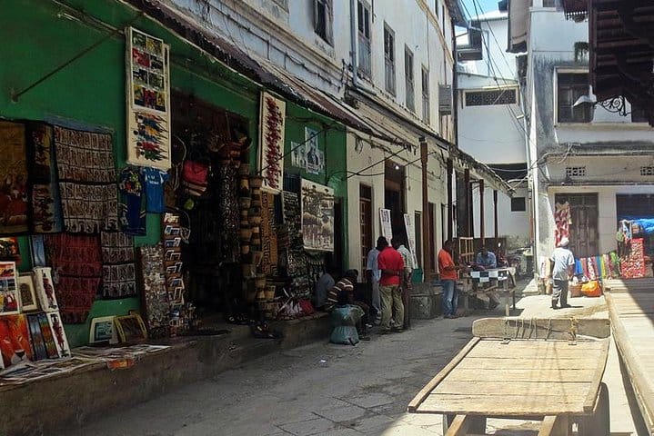 Narrow streets are lined with shops