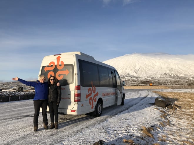 Bustravel guides with Snæfellsjökull glacier in the background