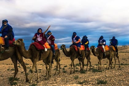 sunset camel ride with dinner show at agafay desert in marrakech