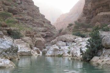 Adventure Day Trip to Wadi Shab and Bimmah Sinkhole from Muscat