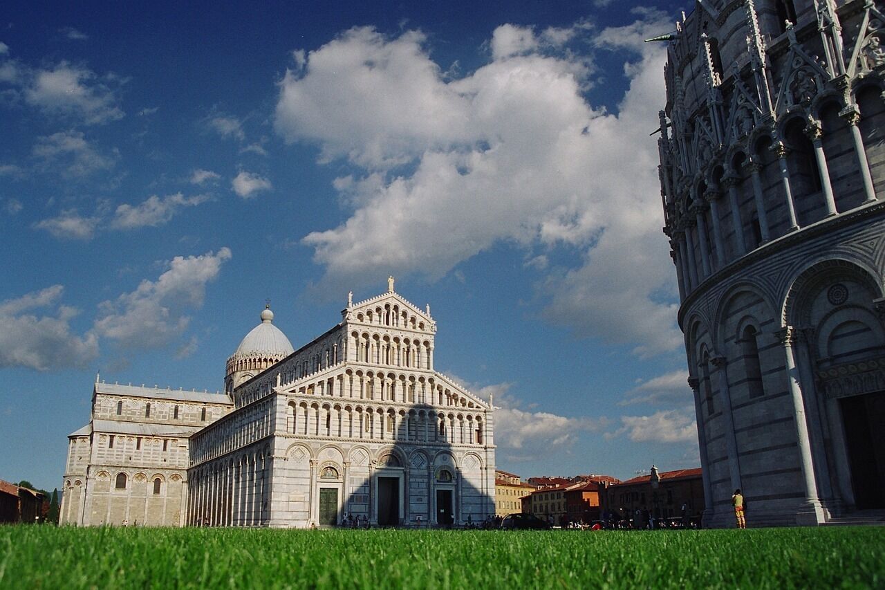 External view of Piazza dei Miracoli with the Cathedral and the Baptistery on the far right of the picture 