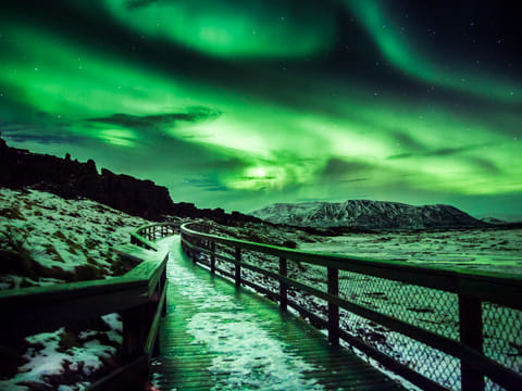 Northernlights overtaking the sky at Thingvellir National Park